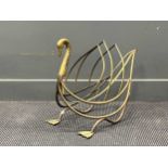 A 20th century Italian swan shaped brass magazine rack, 45 x 59 x 27cm