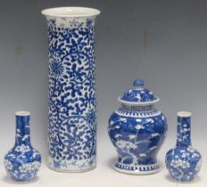 A Chinese blue and white cylindrical vase, 4 character mark, chipped, 36.5cm high; a pair of