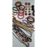 Two freshwater cultured pearl necklaces, and a large collection of beads and costume jewellery