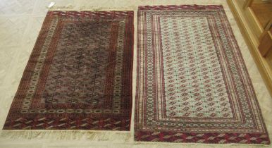 Two Bokhara rugs 211 x 130cm and 200 x 130cm