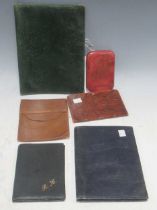 A group of small leather items to include a correspondance pouch by Finnegan in dark green