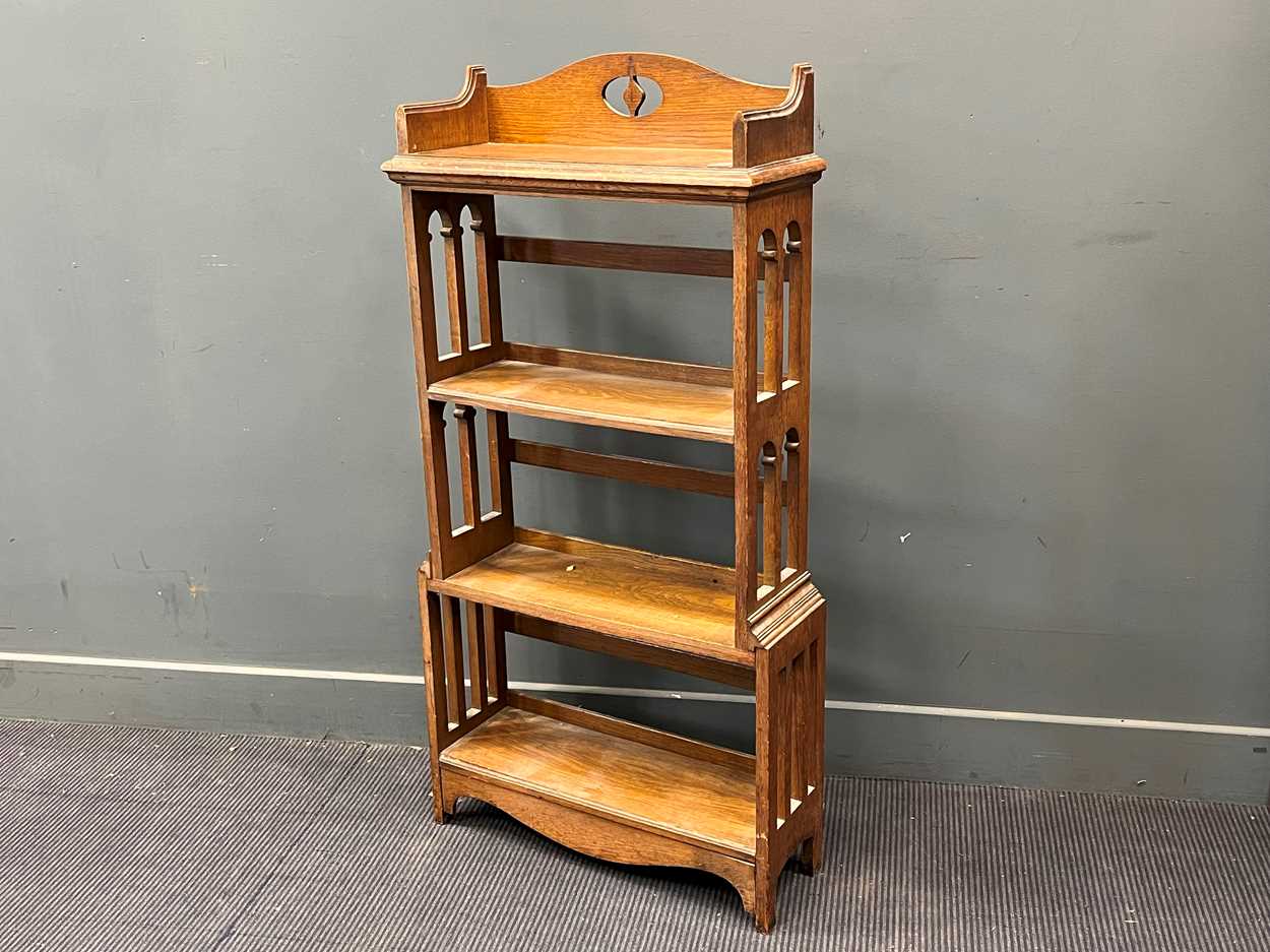 An oak Arts and Crafts book shelf with four open shelves and pierced arched sides 125 x 61 x 21cm, - Image 4 of 4