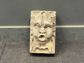 An 18th century style weathered cast stone grotesque fountain mask 31.5 x 19 x 14cm
