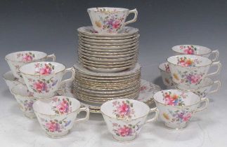 A Royal Crown Derby part tea service with gilt and floral design. Two serving plates, sugar bowl, 12