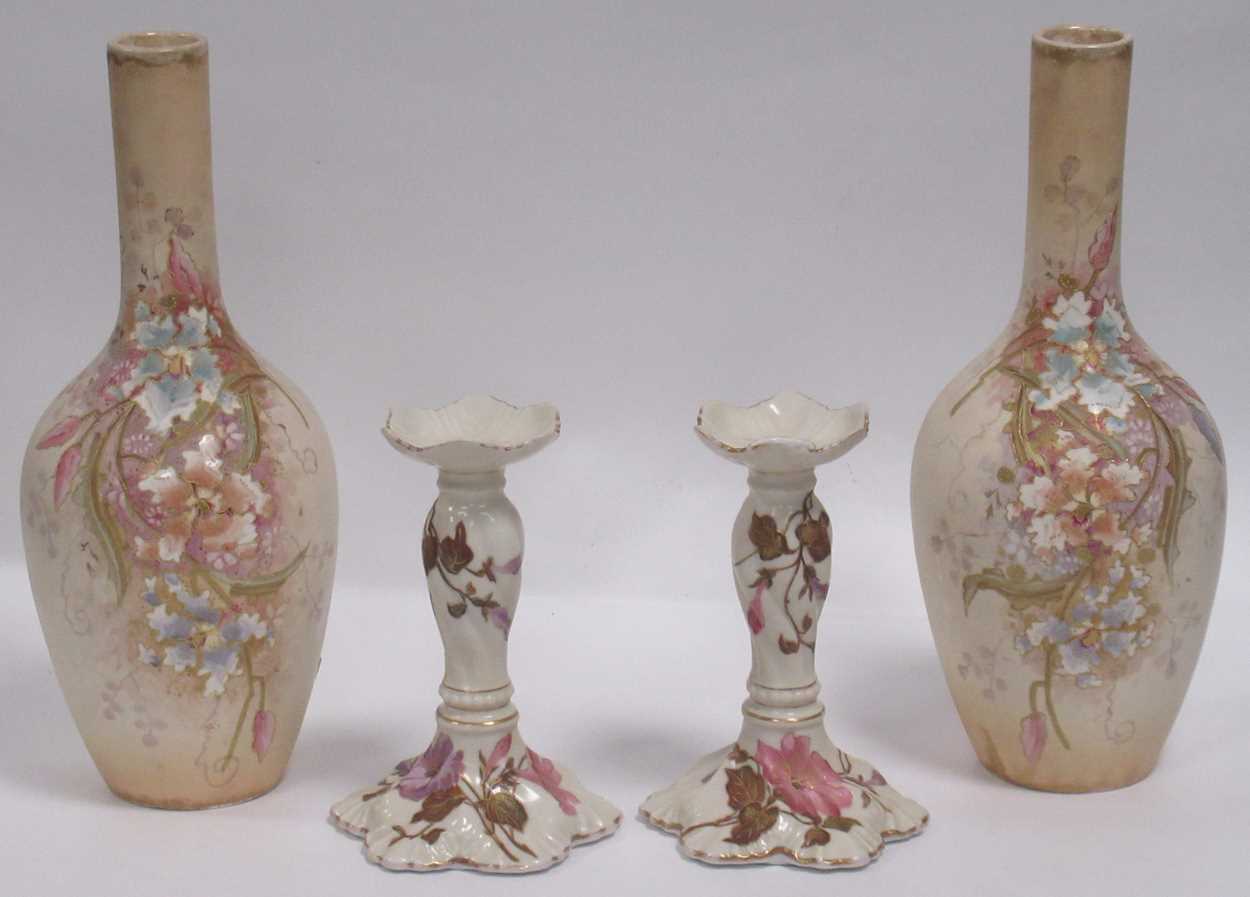 A pair of Royal Bonn vases; together with a pair of Limoges candlesticks (4)