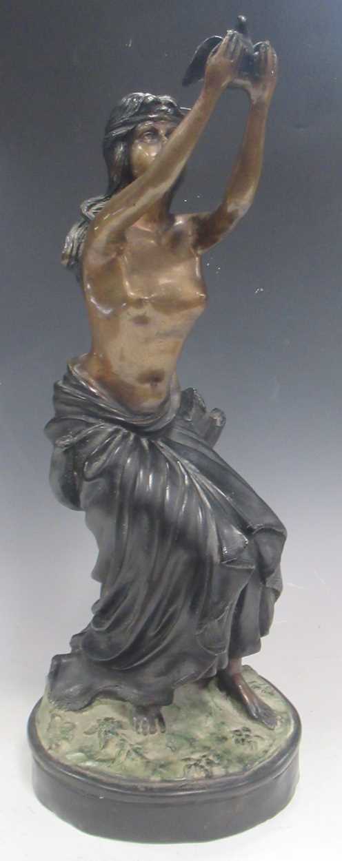 A modern bronze model of a draped young woman holding a dove, about 57cm high, and a bronzed - Image 2 of 6