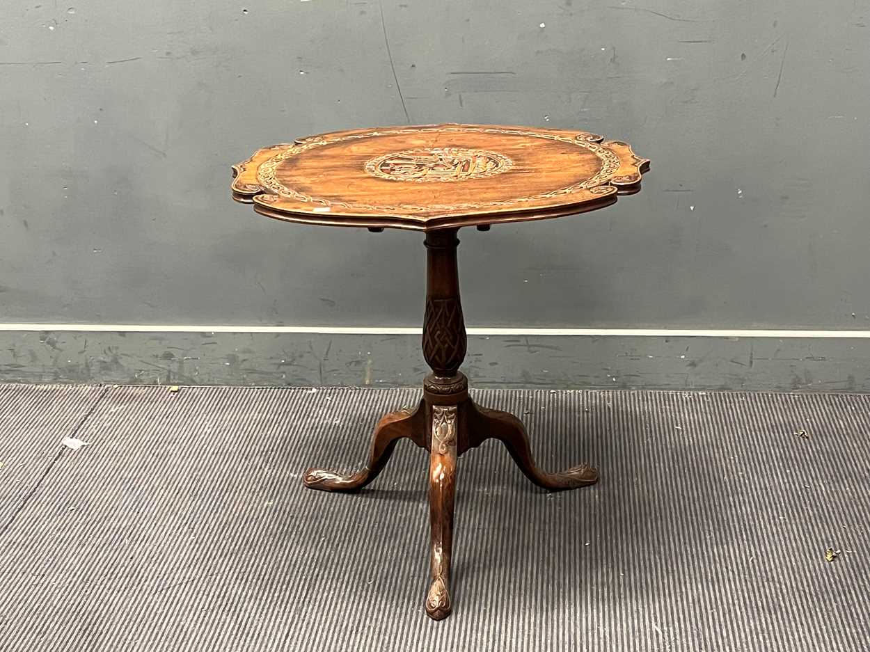 A mahogany snap top tripod table, with carved patterned shaped top on a baluster column and carved - Image 3 of 4