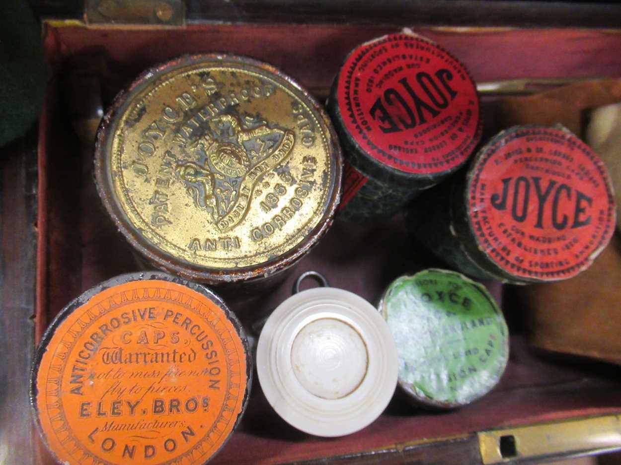 Collection of antique gun spares including ramrods, lead bullets, flints, 4 percussion cap tins - Image 3 of 4
