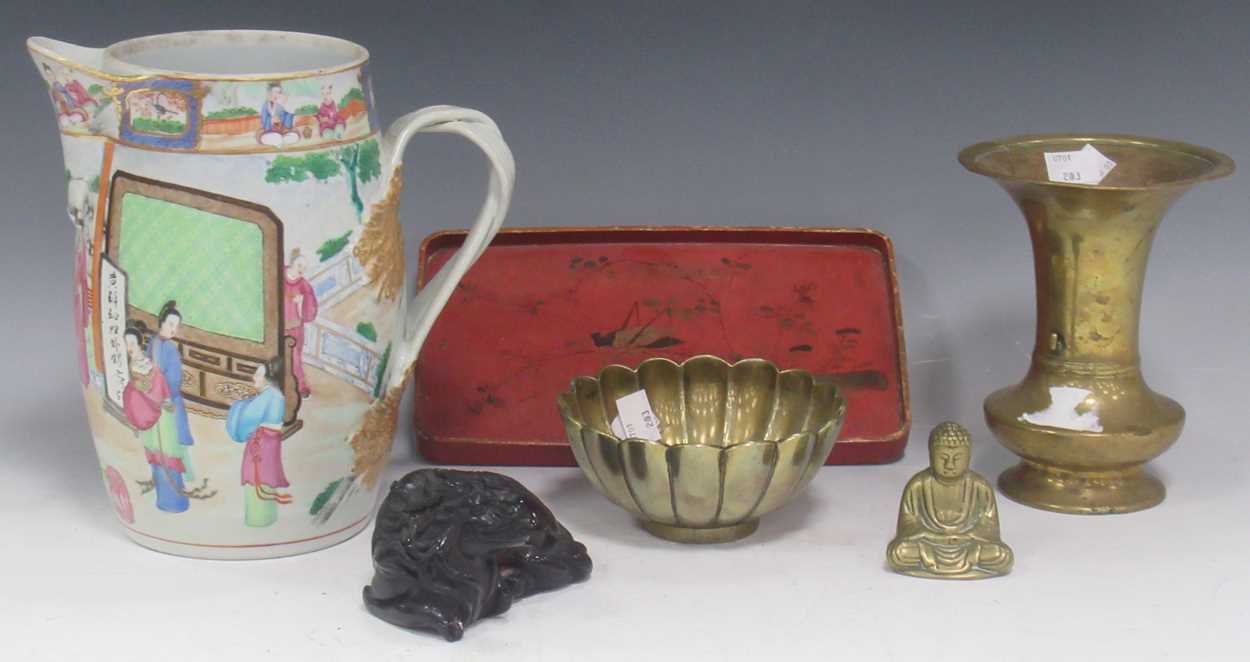 A Chinese red lacquered tray; a model Buddha; bronze lotus bowl, a vase, resin model of a water