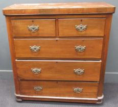A late 19th century walnut chest of drawers with two short over three long drawers on a plinth