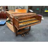 A double manual harpsichord made by Alec Hodson c1939. Set on stand with mahogany case cross