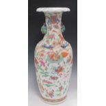 A large Chinese vase, the neck applied with dragons; a pair of Cantonese baluster vases and