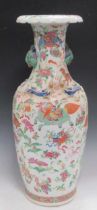 A large Chinese vase, the neck applied with dragons; a pair of Cantonese baluster vases and