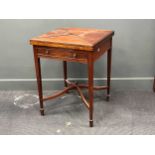 An Edwardian mahogany envelope card table with single drawer on square tapered legs 75 x 57 x 57cm