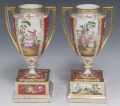 A pair of Continental Dresden type twin handled vases decorated with courting couples and floral