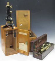 A Watson 'Kima' monocular microscope, boxed; a brass surveyor's level by Troughton & Simms, boxed;
