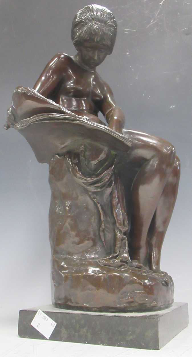 A modern bronze model of a draped young woman holding a dove, about 57cm high, and a bronzed