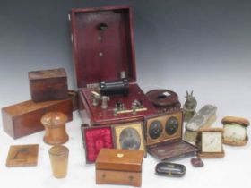 A collection of items to include three travelling clocks, a daguerreotype, a Mascher's improved