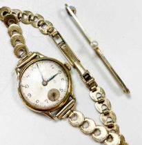 A 9ct bracelet watch, 9.1g ex movement, together with a pearl set bar brooch stamped '15ct&PT', 2.4g
