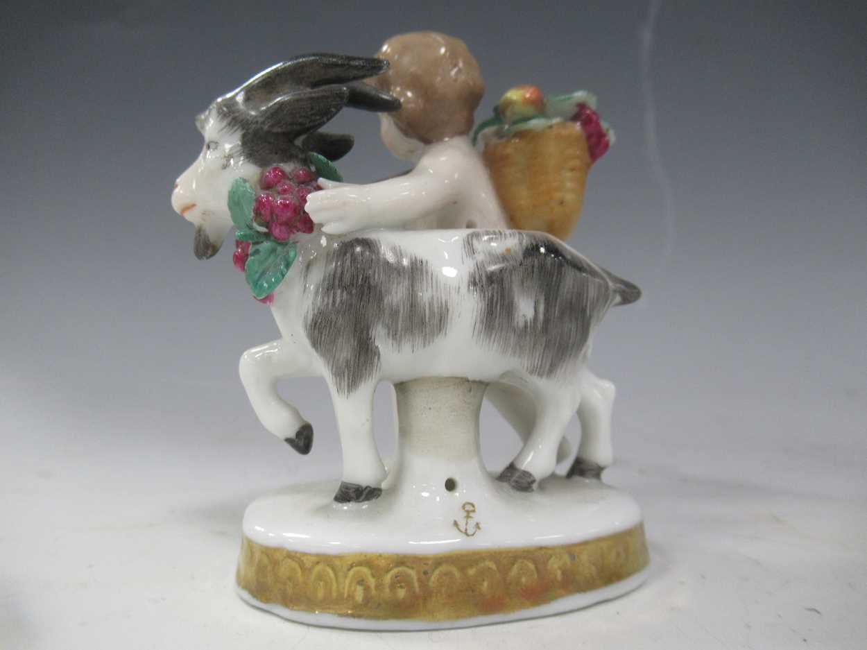 A Continental porcelain figural bonbon dish with Berlin sceptre mark, a putto with goat, a white - Image 7 of 7
