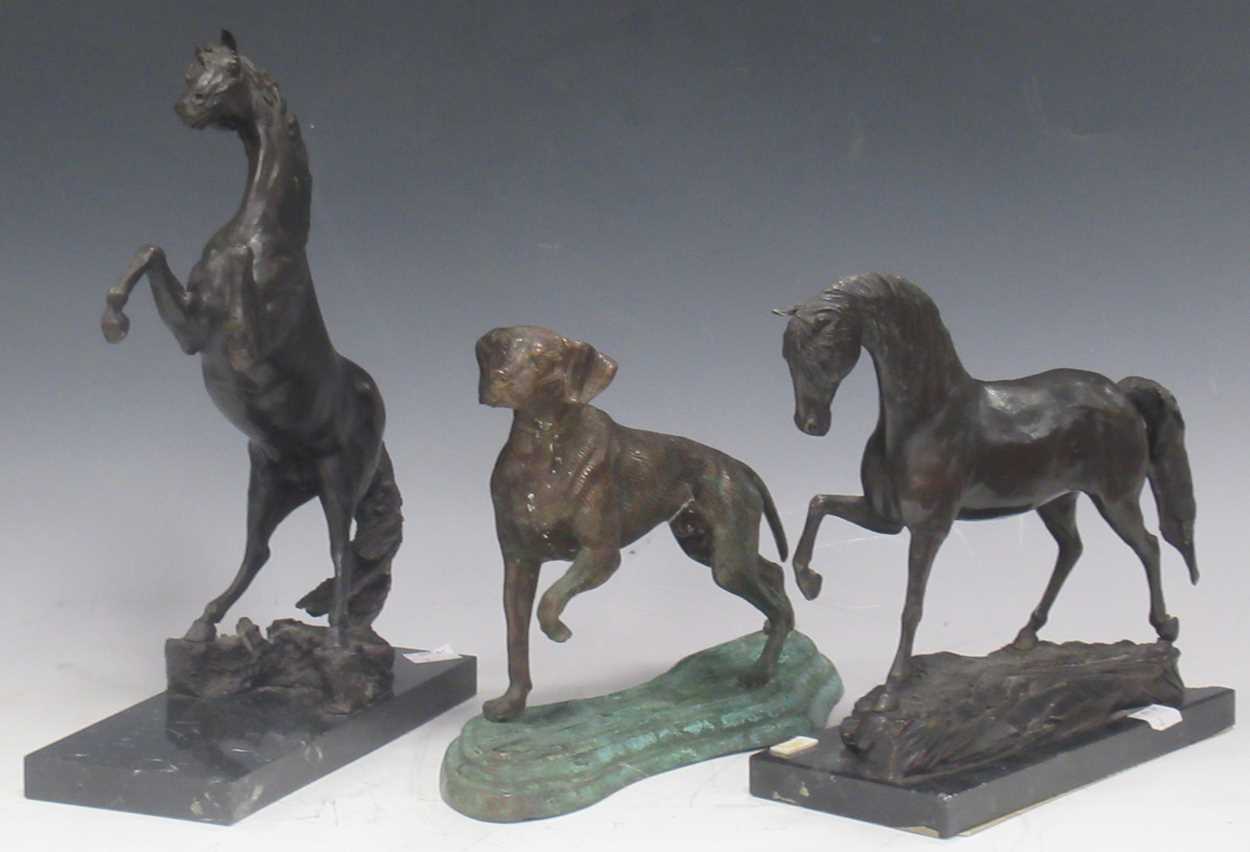 A modern bronze model race horse marked 'Uracan 1990-2B' on broken marble base; another of a rearing