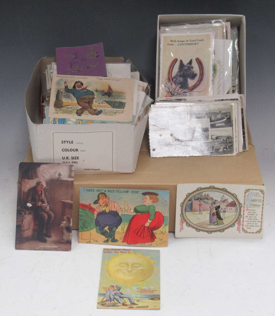 Two boxes of novelty greetings cards, and postcards, Victorian and later, together with box of