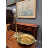 A brass column table lamp with repousse scrolling foliate brass base 56cm excluding fitting,