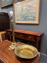 A brass column table lamp with repousse scrolling foliate brass base 56cm excluding fitting,