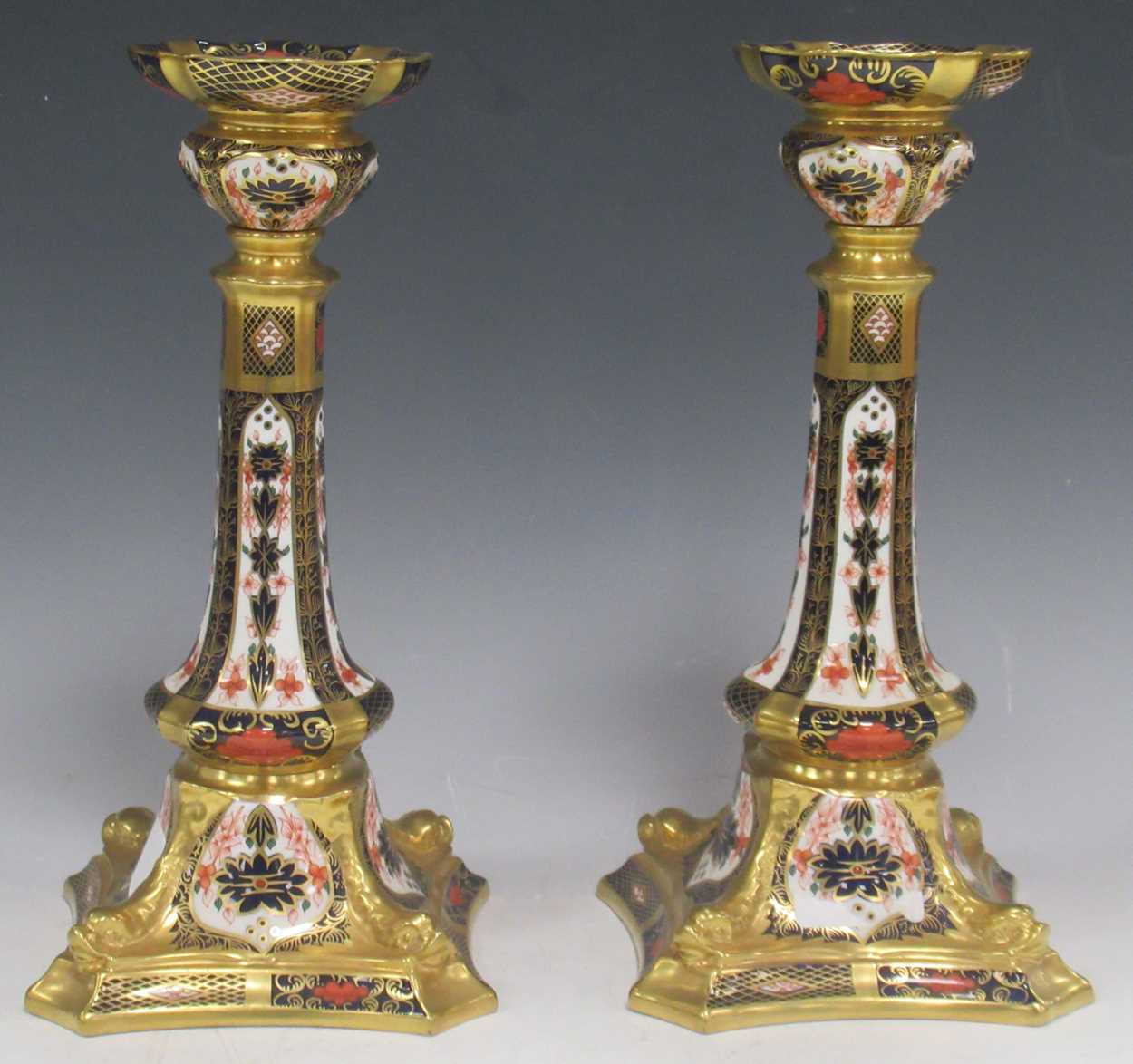 A pair of Royal Crown Derby 1128 pattern candlesticks, 27cm high (2) please see additional images,