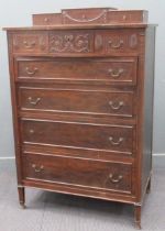 An American Mahogany Neoclassical style chest of drawers circa 1900, decorated with carved moulded