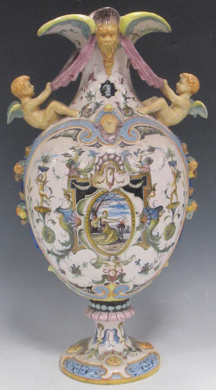 A late 19th century Italian Faience baluster vase decorated with intricate renaissance style motifs,
