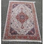 A Tabriz rug 290 x 180cm