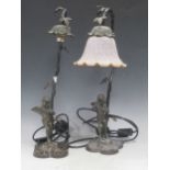 A pair of modern bronze cherub table lamps, the winged figures playing triangles (lacking one