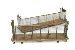 A near pair of brass fenders, 19th century, both mesh grilled with pointed finials 40 x 112 x 40cm