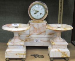 A French clock garniture, comprising a painted dial clock and a pair of circular topped tazze (3)