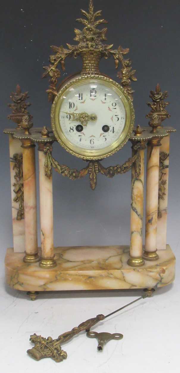 A marble and gilt metal mounted portico clock, the enamelled dial with arabic chapter ring, eight