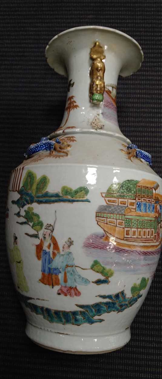 A large Chinese vase, the neck applied with dragons; a pair of Cantonese baluster vases and - Image 25 of 26