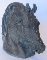 After the Antique, a bronzed terracotta model of a horse's head. 28cm H x 36cm W x 14cm D There is a