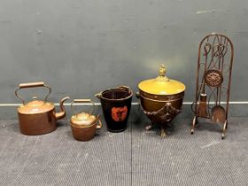 A brass Adam style coal bucket, together with a leather fire bucket, two copper kettles, and set