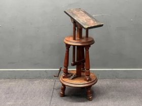 An early 20th century mahogany adjustable sculpture stand 103 x 46cm