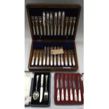 A cased set of twelve pairs of silver dessert knives and forks with mother-of-pearl handles,
