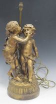 A large gilt metal figure group of two young children after Moreau, fitted as a lamp base, 64cm