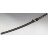 A Japanese WW2 regulation sword with rusted scabbard, of typical design We do not offer a packing