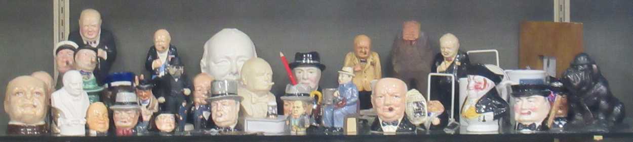 A mixed collection of Winston Churchill commemorative wares including model jugs, composition