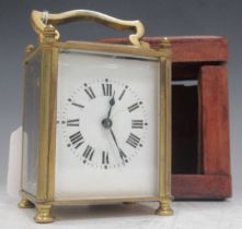 A Swiss made brass carriage clock, cased 11 x 9.5 x 9cm