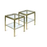 A pair of two tier brass lamp tables,