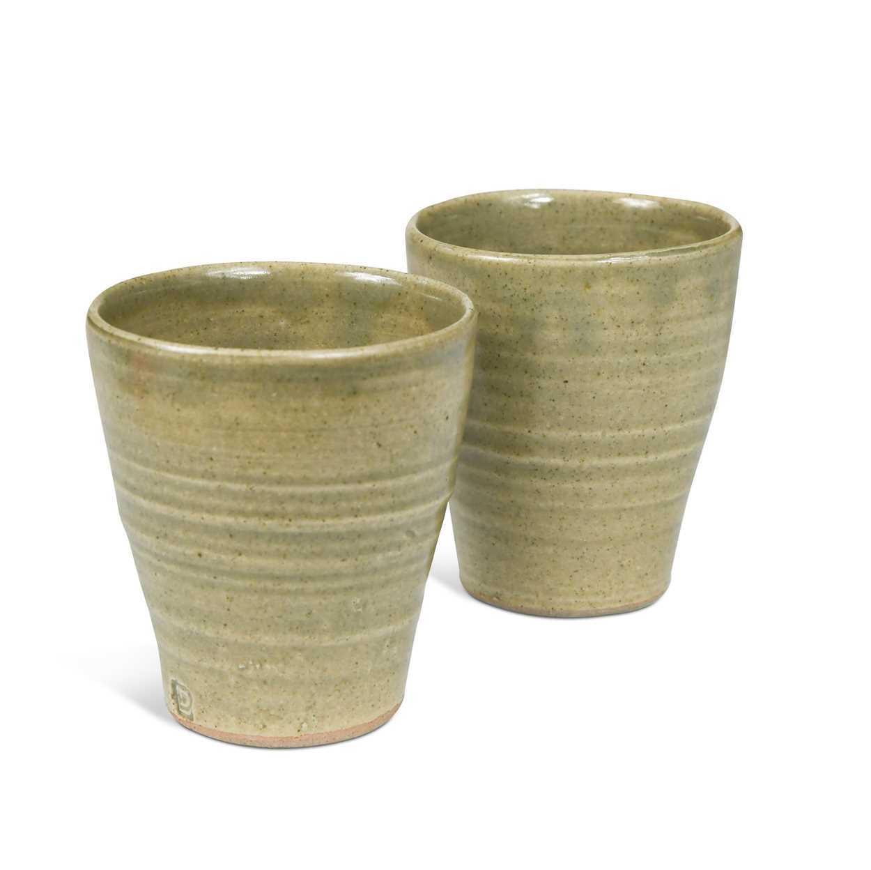 § David Leach OBE (1911-2005), a pair of celadon glazed stoneware tumbler cups,