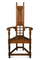 Attributed to William Bartlett for Liberty & Co., an oak Shakespeare Chair,