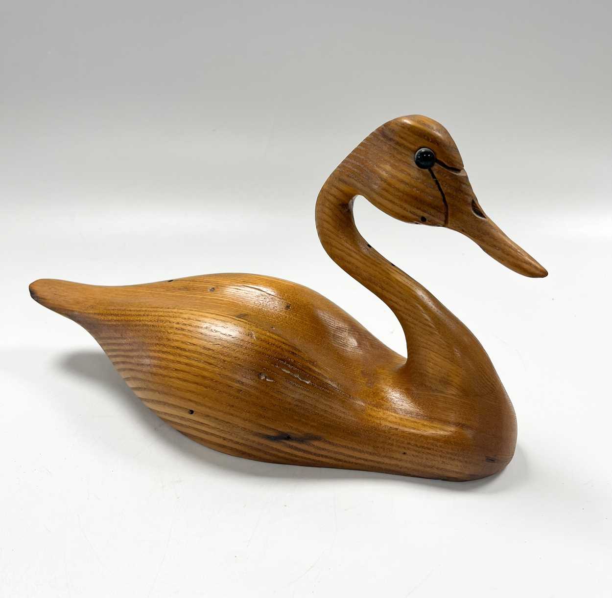 § Andy Pouch (Contemporary), four carved 'wormy chestnut' model swans, - Image 15 of 16