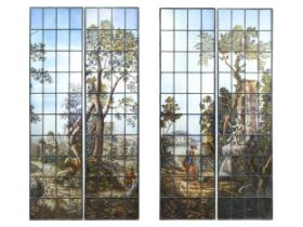 A pair of pastoral scenes in stained glass,